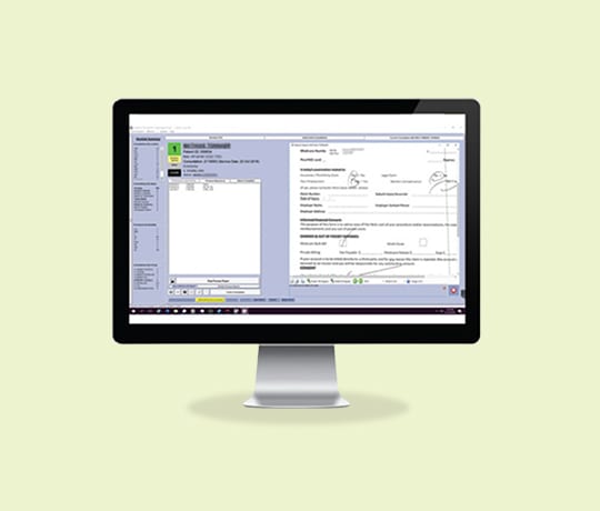 OCCAM RIS patient and examination workflow displayed on a desktop monitor.